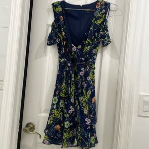 Bright floral dress by Tahari size 6 zip up back, tie at waist, draping sleeves